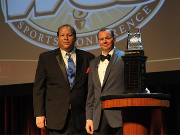 WCS District Athletic Director, Jeremy Qualls and Page High School Athletic Director, Charles Rathbone at the WILLCOs with the Directors Cup in 2015-16.